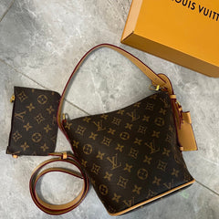 Leather Monogram Bucket Mini Pouch Bag
